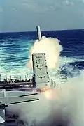 A BGM-109 Tomahawk Land-Attack Missile (TLAM) is launched toward a target in Iraq from the port side Mark 143 Armored Box Launcher (ABL) on the stern of Mississippi during Operation Desert Storm.