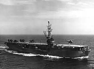 An aerial view of USS Point Cruz (CVE-119), 25 June 1955.