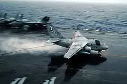 An S-3B from VS-21 lands on board the USS John C. Stennis CVN-74 on 14 October 2004, during the latter's transit through the Western Pacific.