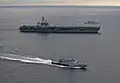 KD Kelantan (fore) with USS&nbsp;Carl Vinson and Kasturi-class corvette KD Lekir.
