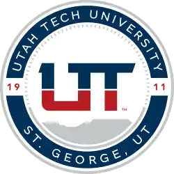 The presidential seal of Utah Tech University, with a representation of the red rocks behind it