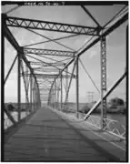 View: Looking south, showing deck, vertical, upper strut and bracing detail