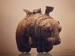 Vase in the shape of a hippopotamus. Early Predynastic, Badarian. 5th millennium BC. From Mostagedda. This vessel is carved from elephant ivory. The fine modeling and attention to detail show the skill in achieving these pieces.