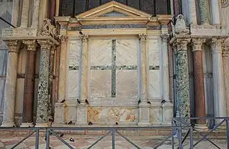 former entry blocked with marble altar seen from back