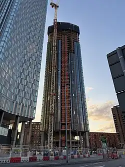 Tower 1 under construction in May 2025