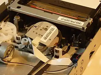 VXA-1 tape drive with tape loaded, view from rear left