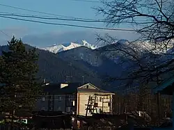 Picture of a house behind a Mountain