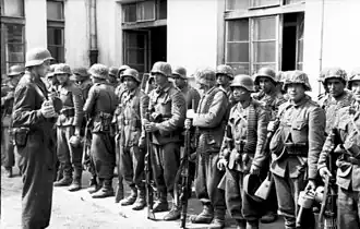 Well-armed soldiers of the "Dönmec" battalion, an Azerbaijani SS volunteer formation during the Warsaw Uprising