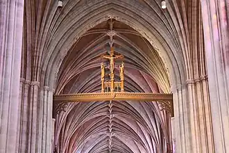 The rood in the chancel arch, high above the rood screen ending the nave