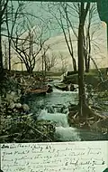 An early-20th-century postcard of Laundry Brook below Bullough's Pond dam