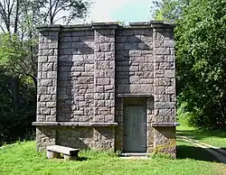A small rectangular stone building