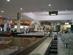 The food court in Westfield Whitford City which has been extensively renovated since.