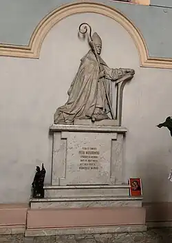 Memorial plate and statue for bishop Piotr Paweł Wierzbowski in Sejny Cathedral