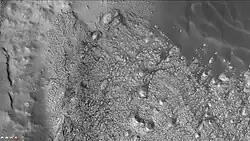 Some of the layers of Danielson are just visible in this CTX image. Dunes are also visible.