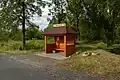 Bus stop with bus stop shelter