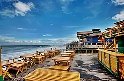 Image 16Cox's Bazar in Bangladesh known for its wide sandy beach, is believed to be the world's longest (120 km) natural sandy sea beach. It is located 152 km south of Chittagong. The photo features a beach restaurant at Cox's Bazar. Photo Credit: Xalan mustafa