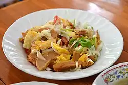 Yam mu yo thot khai dao, a spicy Thai salad made with fried mu yo and khai dao