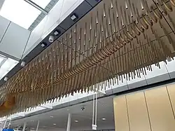 Art piece on the ceiling as described in the following paragraph