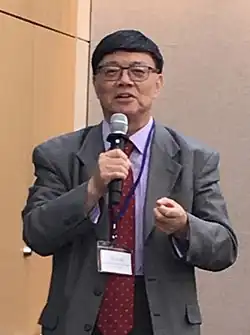 Song Yongyi Speaking at a Conference