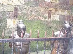 Statues of Moqi Xie (万俟卨) and Zhang Jun at the Tomb of Yue Fei, Hangzhou