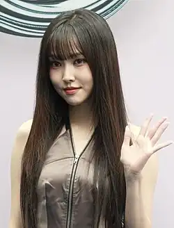 Yuju in Seoul Fashion Week in September 2024.