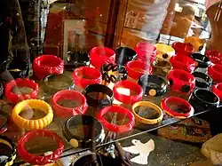 colorful bracelets on a glass table