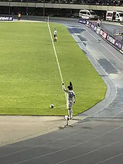 Captain Zhang Xizhe readies a corner in his 400th Guoan appearance on 21 May