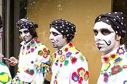 Colourfully-dressed mimes