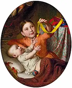 Two children playing with silk ribbons