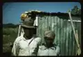 "FSA - Tenant Purchase borrowers? by their house", Puerto Rico. 1941