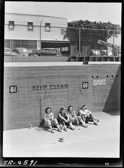 Lunchtime at the Vega aircraft plant, Burbank, Calif. A quartet of girl workers. [Aug 1943][11]